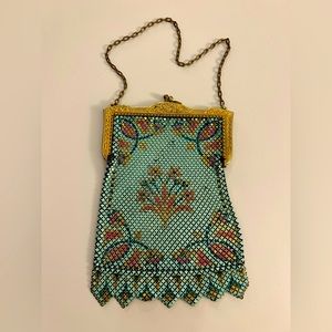 Antique painted chainmail purse. Typical wear for its age. Lovely piece.